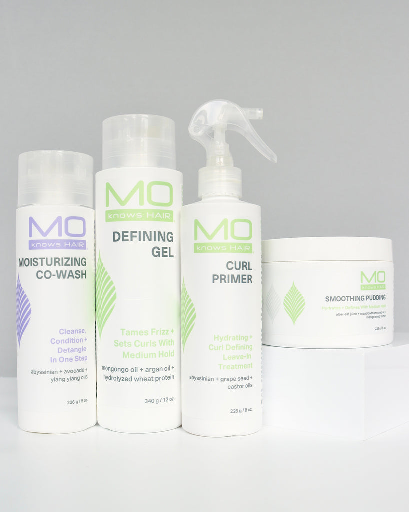 MoKnowsHair Refresh and Style bundle with moisturizing co-wash, curl primer, smoothing pudding and defining gel on gray background